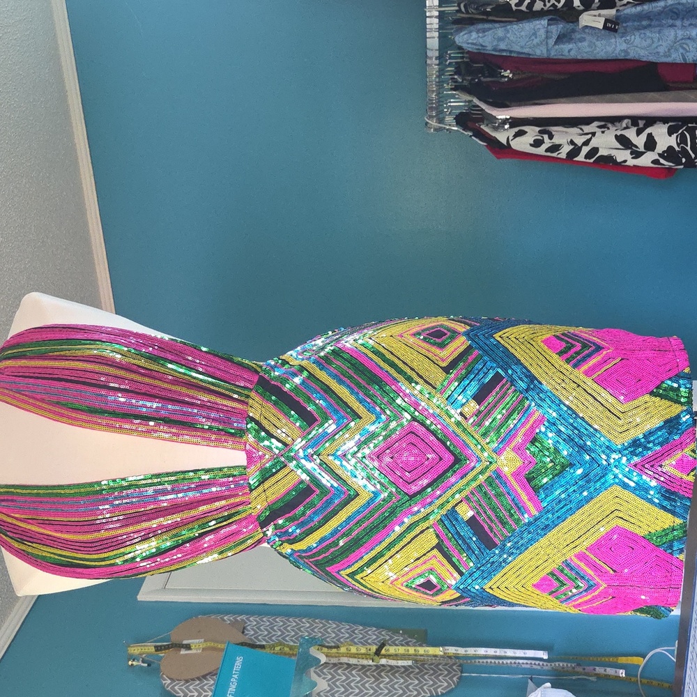 2 sequined outfits One Dress Skirt Set